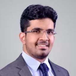 Dr. Arjun R