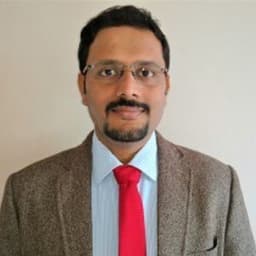 Dr. Milind Patil