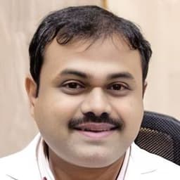 Dr. Ravikiran M